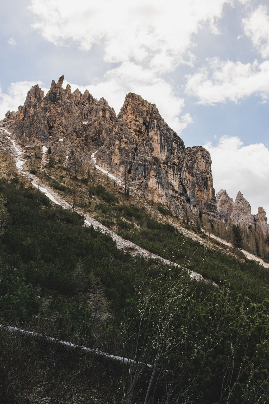 Jagged alpine peaks and green meadows in the Dolomites